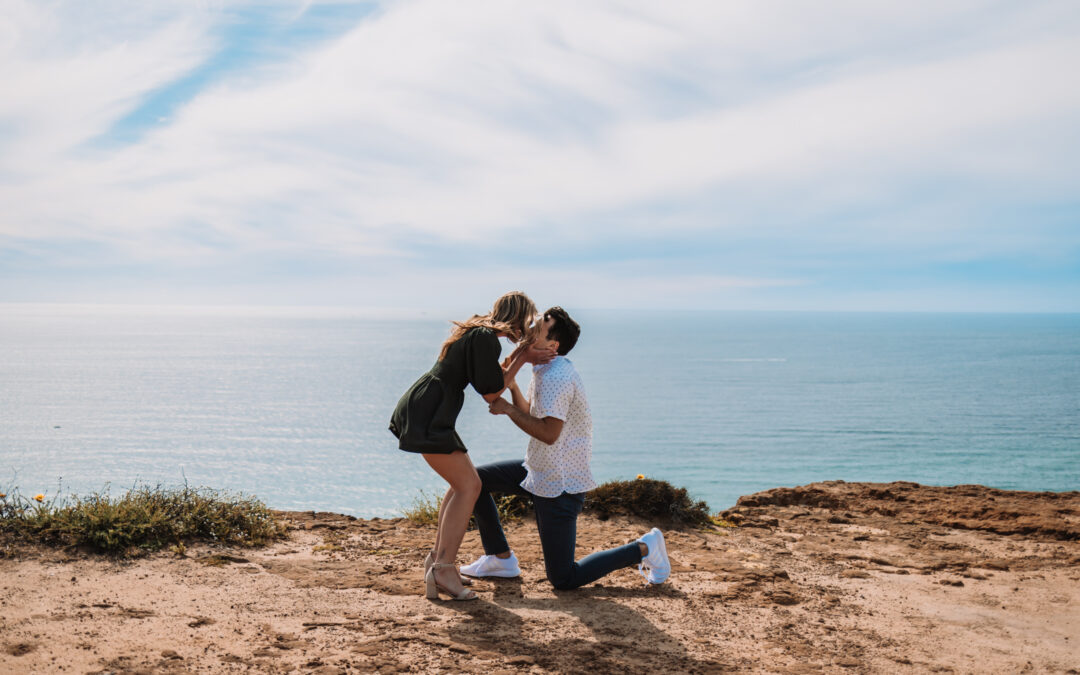 San Diego Couples Session suddenly turned up when he hit his knees. The Surprise Engagement Proposal was Photographer by local San Diego Photographer, Brandon Colbert Photography at Cabrillo National Monument.